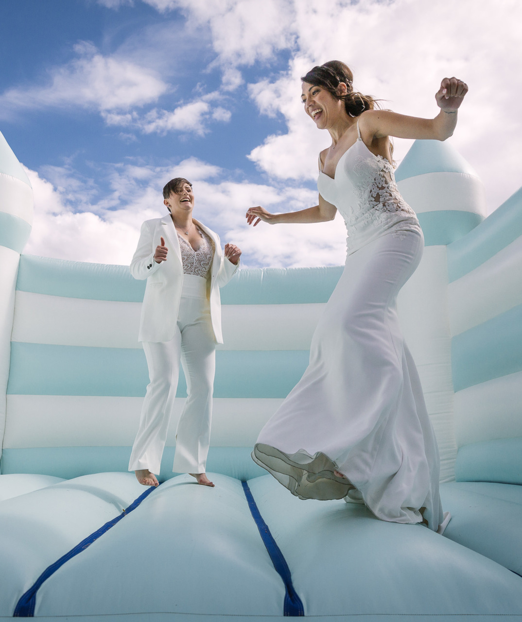 Bride on bouncy castle